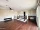 Spacious loft features hardwood floors, built-in desk, and staircase with decorative iron railing at 18515 N 94Th St, Scottsdale, AZ 85255