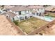 Aerial view showcasing backyard with pool and covered patio at 20358 N Valencia N Dr, Maricopa, AZ 85138