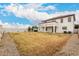 Spacious backyard and covered patio, perfect for outdoor activities and relaxation at 20358 N Valencia N Dr, Maricopa, AZ 85138