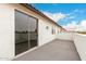 Private balcony features neutral paint, sliding glass doors, and offers a relaxing outdoor space at 20358 N Valencia N Dr, Maricopa, AZ 85138