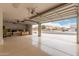 Open garage showcasing neighborhood street view, ample natural light, and plentiful space at 20358 N Valencia N Dr, Maricopa, AZ 85138