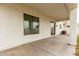 Covered patio with concrete flooring, providing a comfortable outdoor space for relaxing and entertaining at 20358 N Valencia N Dr, Maricopa, AZ 85138