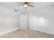Clean, bright bedroom featuring tile floors and ceiling fan at 2220 W Dora St # 129, Mesa, AZ 85201