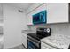 Modern kitchen with stainless steel appliances and granite countertops at 2220 W Dora St # 129, Mesa, AZ 85201