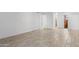 Open living space featuring tile flooring, neutral walls, and plenty of natural light at 2220 W Dora St # 129, Mesa, AZ 85201