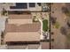 Bird's-eye view of a well-maintained property featuring a tidy backyard, patio furniture, and pristine landscaping at 24757 N 175 Dr, Surprise, AZ 85387