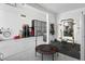Functional garage with storage cabinets and space for fitness equipment and recreation at 24757 N 175 Dr, Surprise, AZ 85387
