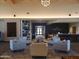 A welcoming lobby area with comfortable seating, stylish decor, and modern lighting at 24757 N 175 Dr, Surprise, AZ 85387