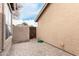 Private backyard with a well-maintained block fence and a beautiful paver patio at 2875 W Highland St # 1213, Chandler, AZ 85224