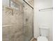 Updated bathroom featuring a tiled shower with glass door and modern fixtures, ensuring a sleek design at 2875 W Highland St # 1213, Chandler, AZ 85224