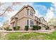 Two-story townhome featuring tile roof, desert landscaping, and well-maintained grounds at 2875 W Highland St # 1213, Chandler, AZ 85224