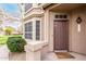 Inviting front entrance featuring a brown door and well-maintained landscaping at 2875 W Highland St # 1213, Chandler, AZ 85224