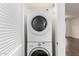 Modern, stacked washer and dryer, offering space-saving convenience and efficiency at 2875 W Highland St # 1213, Chandler, AZ 85224