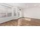 Bright living room with hardwood floors and access to the outdoor area at 2875 W Highland St # 1213, Chandler, AZ 85224