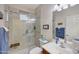 Bathroom with a glass shower and a wooden seat at 3134 N 145Th Ave, Goodyear, AZ 85395