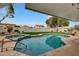 Beautiful backyard pool and spa with landscaped surroundings and a private setting at 3134 N 145Th Ave, Goodyear, AZ 85395