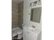 Bathroom featuring a stall shower, updated vanity, and modern fixtures at 319 N 2Nd Ave, Avondale, AZ 85323