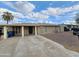 Single story home featuring a low pitched roof and a well kept yard at 319 N 2Nd Ave, Avondale, AZ 85323