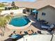 Aerial view of backyard, pool, and patio seating area at 3362 N 159Th Ave, Goodyear, AZ 85395