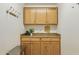 A mud room with coat hooks, cabinets, counter space and drawers at 3362 N 159Th Ave, Goodyear, AZ 85395