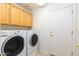 Functional laundry room with modern washer and dryer, offering convenience and efficiency for everyday chores at 3631 S Greythorne S Way, Chandler, AZ 85248