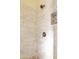 Shower with white tile walls, a showerhead, and a built-in shelf at 3631 S Greythorne S Way, Chandler, AZ 85248