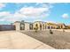 Landscaped front yard accentuates the desert charm of this lovely home with a two-car garage at 3743 W Hartford Ave, Glendale, AZ 85308