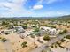 Expansive aerial view showcases the property's lush landscaping and convenient location within the neighborhood at 38234 N 15Th Ave, Phoenix, AZ 85086