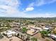 An aerial view of the neighborhood, featuring community landscaping, and a convenient location at 38234 N 15Th Ave, Phoenix, AZ 85086