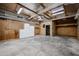 Spacious garage featuring ample storage, a concrete floor, and lighting at 38234 N 15Th Ave, Phoenix, AZ 85086