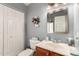 The bathroom is a cozy space with a neutral color scheme and ample storage at 4122 E Jojoba Rd, Phoenix, AZ 85044