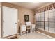 A well-organized home office area featuring a white desk and ample storage at 4122 E Jojoba Rd, Phoenix, AZ 85044