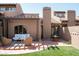 Inviting backyard patio area perfect for outdoor living and entertaining with comfortable seating arrangements at 4442 E Camelback Rd # 161, Phoenix, AZ 85018