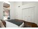 Bedroom with large window and hardwood floors at 4442 E Camelback Rd # 161, Phoenix, AZ 85018
