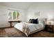 Comfortable main bedroom with large window and hardwood floors at 4442 E Camelback Rd # 161, Phoenix, AZ 85018