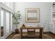 Bright home office boasts hardwood floors, art, and natural light at 4442 E Camelback Rd # 161, Phoenix, AZ 85018