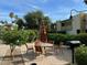 Outdoor dining and grilling area with comfortable seating at 4620 N 68Th St # 117, Scottsdale, AZ 85251