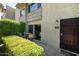 Private patio with seating, accessible through sliding doors at 4620 N 68Th St # 117, Scottsdale, AZ 85251
