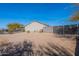 Large backyard with block wall, offering plenty of space for gardening and entertaining at 532 N 102Nd Pl, Mesa, AZ 85207