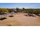 Picture showing the multiple horse corals with open area for riding and care at 532 N 102Nd Pl, Mesa, AZ 85207