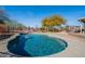 Sparkling pool with a spacious deck for lounging and outdoor entertaining under a sunny blue sky at 532 N 102Nd Pl, Mesa, AZ 85207