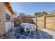 Inviting backyard with dining area on a patterned rug and bar with seating at 541 W Edgemont Ave, Phoenix, AZ 85003