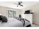 Cozy bedroom featuring gray wood-style floors at 619 S Desert Flower Dr, Mesa, AZ 85208