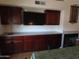 The dining room has a fireplace and a long table and chairs that seats 14 at 639 W Us Highway 60 Hwy, Superior, AZ 85173