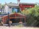 View of the property with an enclosed patio area and a well-maintained fence at 639 W Us Highway 60 Hwy, Superior, AZ 85173