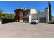 Exterior view of the property, featuring distinct architectural design, parking, and landscaping at 639 W Us Highway 60 Hwy, Superior, AZ 85173
