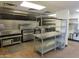 Commercial kitchen featuring stainless steel equipment and ample workspace at 639 W Us Highway 60 Hwy, Superior, AZ 85173