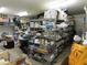 A storage room with metal shelves and a lot of items sitting on the shelves at 639 W Us Highway 60 Hwy, Superior, AZ 85173