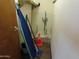 This storage room has a cleaning rack, and a table on the other side at 639 W Us Highway 60 Hwy, Superior, AZ 85173