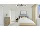 Serene bedroom with natural light, modern furnishings, and a minimalist aesthetic at 724 S Lewis --, Mesa, AZ 85210